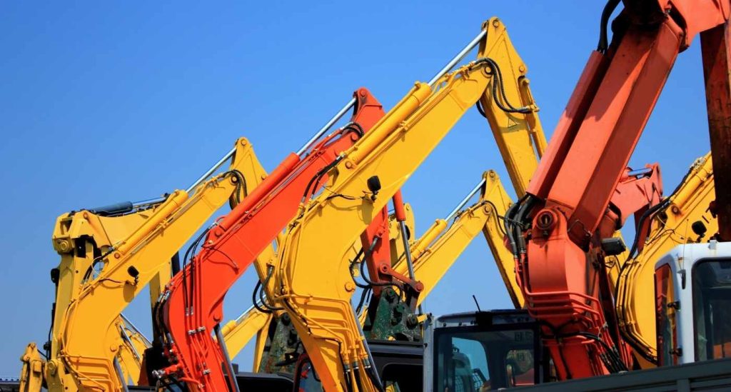 Työkoneiden teippaus työmaille, teollisuuteen ja urakointiin